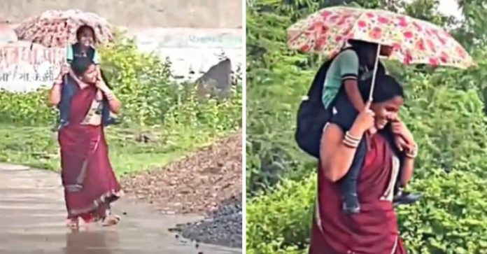 Mulher é elogiada por carregar filha nos ombos durante chuva, não há limites para o amor materno